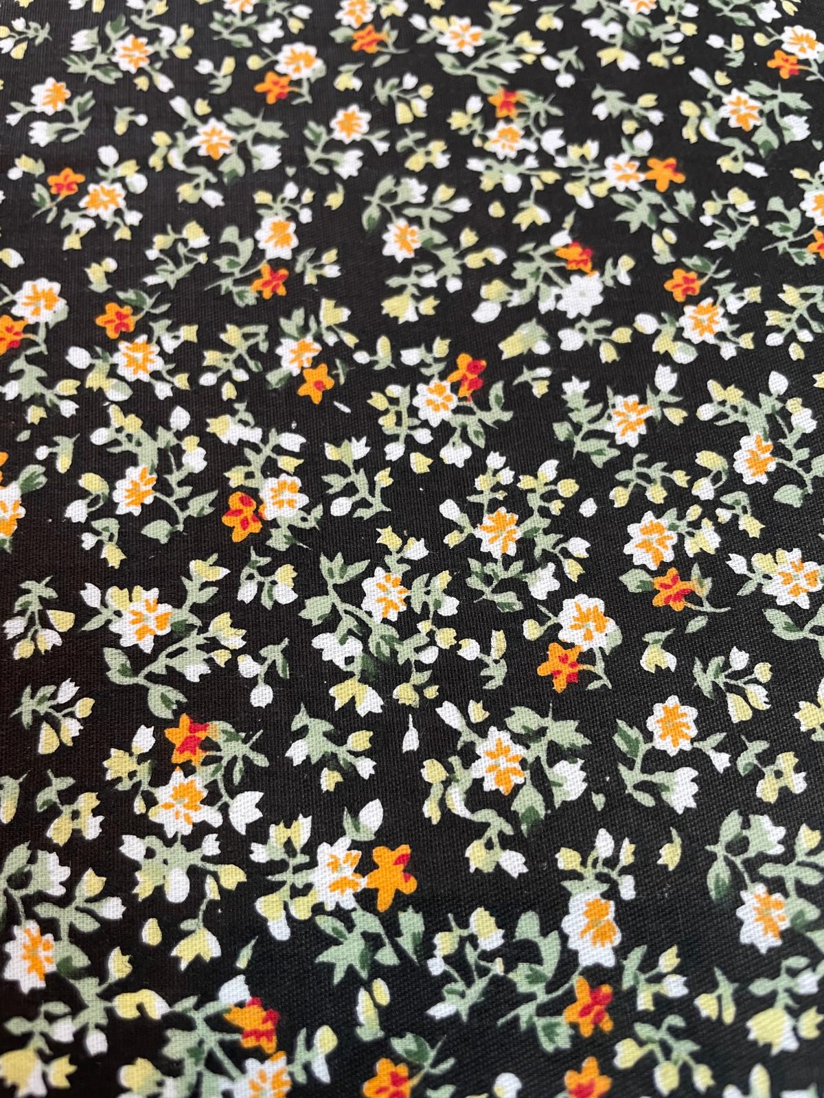 Beschichtete Baumwolle "Nachtblüte" schwarz mit Blumenmuster